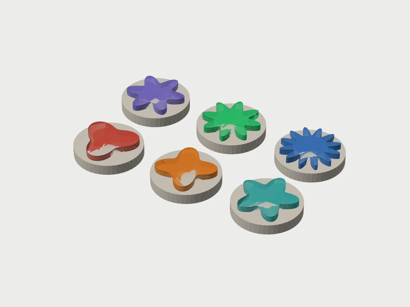Render of the print file: six round stamps with different star-like radial symmetry patterns